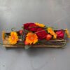 Herfstbloemstukje met bananenblad