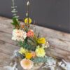 Tafelversiering pasen bloemen bloemenloods bloemstuk